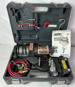 lot 40 image: Champion Power Equipment Model C20249 2000lb 12 Volt DC Electric Winch