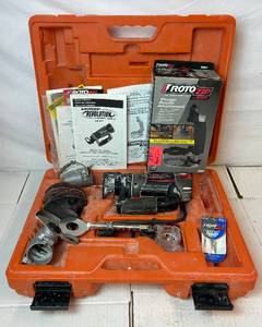 lot 42 image: RotoZip Revolution Spiral Saw Kit Model REV01 with ROTOZIP Circle Cutter, RotoZip Plunge Router Attachment and 2  Zip Mate Attachments
