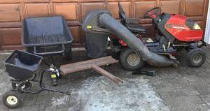lot 7 image: Craftsman Revolution Zero Turn Lawn Mower, 42 Bagger, Broadcast Spreader, Dethatcher and Utility Cart