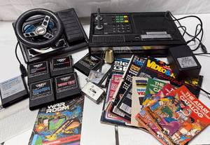 lot 20 image: ColecoVision Home Video Game Console, Expansion Module #2 Steering Wheel Controller and 6 Games