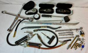 lot 95 image: Tire Service Bundle includes Craftsman 2 14 Ton Jack Model 875.505230 comes with Hard Case (latch is broken) , Tire Inflators, and Assorted Tire Tools