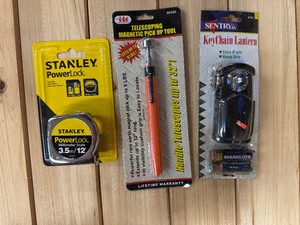 lot 94 image: Stanley 12 Tape Measure, Telescoping Magnetic Pick-up Tool, Key Chain Lantern all New in Box