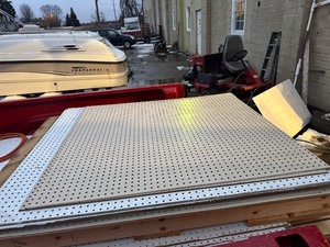 lot 100 image: Tool Peg Board Sheets. 10 Sheets. See pictures for measurements.