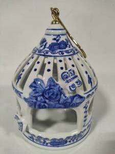 lot 7 image: Formalities by Baum Brothers Decorative Blue & White Ceramic Bird Cage