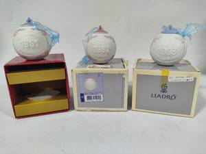 lot 37 image: Lladro 1991, 1992 & 1993 Round Ball Christmas Ornaments wBox