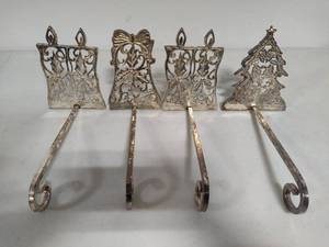 lot 109 image: Bombay Metal Stocking Hangers (4)