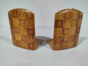lot 176 image: Interesting Leather Embossed Bookends
