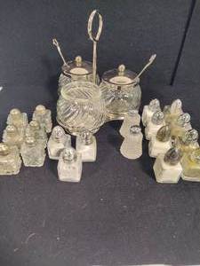 lot 219 image: Three-Jar Serving Dish  Oodles of Salt & Pepper Shakers