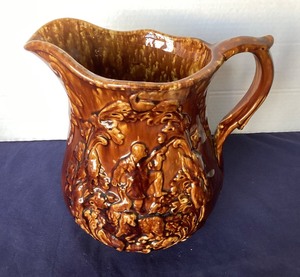 lot 69 image: Antique Rockingham  Bennington Pitcher