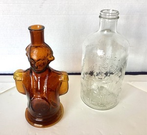 lot 101 image: Fun Pair of Vintage Bottles