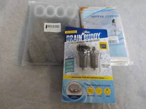 lot 209 image: Shower Curtain and Drain Buddy...