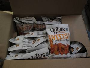 lot 74 image: 24 1.5 oz bags of Uglies sweet pota...