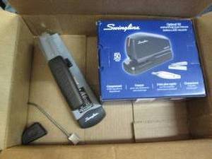 lot 124 image: Electric and manual staplers, the m...