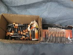 lot 164 image: AA and AAA Duracell batteries...