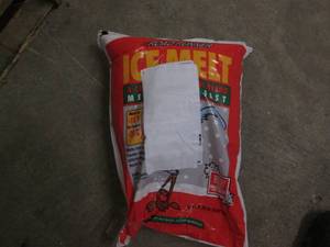 lot 211 image: 20 pounds ice melt...