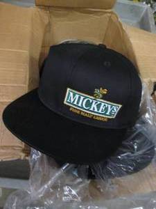 lot 273 image: Case of 12 Mickeys malt liquor caps...