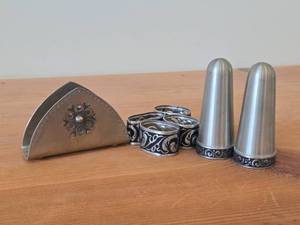 lot 27 image: Lot of (7) Norsk Tinn Pewter Housewares - (4) Napkin Holders, (1) Napkin Holder by Rolf, (2) Salt and Pepper Shakers (Norway)
