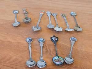 lot 81 image: Lot of (11) 138-grams (total) Silverplated Souvenir Spoons