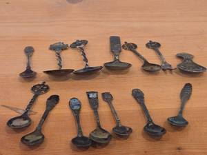 lot 91 image: Lot of (14) 216-grams (total) 40G Silverplated Souvenir Spoons