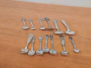 lot 90 image: Lot of (13) 189-grams (total) 40G Silverplated Souvenir Spoons