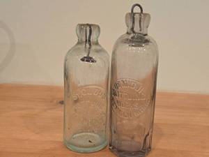 lot 109 image: Lot of (2) Vintage Soda Bottles  Hutchinson style