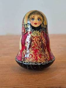 lot 156 image: Vintage Handpainted Russian Matryoshka Roly-Poly Musical Wobbling Doll