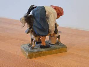 lot 174 image: Vintage Milkmaid Milking a Goat theme Handcrafted Figurine by Henning Engelson (Norway)