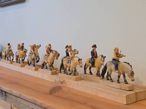 lot 177 image: Complete Collection of 11 Authentic Hand Carved Handpainted Wooden Figurines os Traditional Norwegian Wedding Entourage on Horseback by Henning Engelsen of Norway