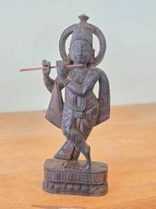 lot 304 image: Vintage Hand Carved Wooden Statue of a Hindu Deity Krishna Playing Flute