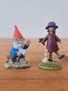 lot 316 image: Lot of (2) Vintage Figurines - Porcelain Gnome by Gorham 1980s, Resin Girl and Rabbit by Blossom Bucket (China)