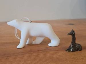 lot 320 image: Lot of (2) Figurines - Parastone Polar Bear Christmas Ornament Mini Reproduction of Frances Pompons Famous LOurs Blane Sculpture 5x3, Mini Pewter Giraffe Figurine 2x2