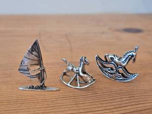 lot 25L image: (2) Sterling Silver Figurines 10-grams (total)  (1) 800 Silver Figurine 6.5-grams (total)