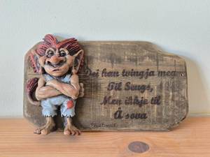lot 219 image: Vintage Scandinavian Troll theme Dei han twingja mea Til Sengs Men ilkje til A sova Wall Plaque by Paul Bonner� Bebe� (Norway)