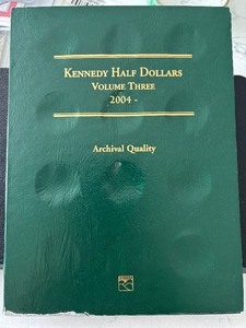 lot 2 image: Kennedy Half Dollars and Book