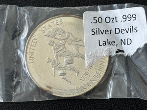 lot 23 image: 12 Ounce .999 Fine Silver Round 1976 Devils Lake Coin Club