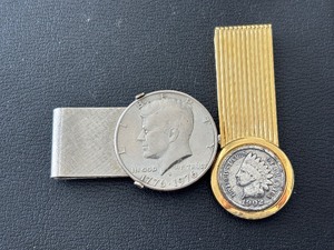 lot 97 image: Money Clips with Coins