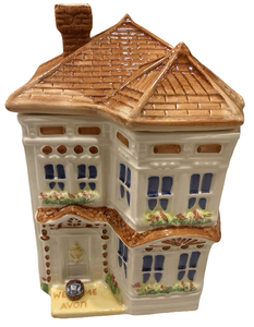 lot 87 image: Avon Townhouse Cookie Jar from Avons Canister Collection