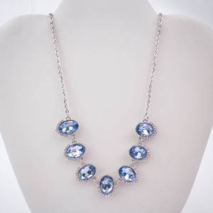 Blue Oval Crystal Necklace with Halo Setting on Silver Chain