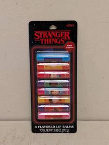 lot 34 image: NEW STRANGER THINGS LIP BALM 8PK