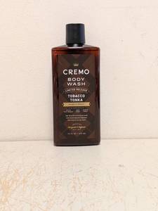 lot 52 image: NEW CREMO BODY WASH TOBACCO TONKA