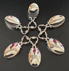 lot 134R image: LL - Six Vintage Silver-Tone Dessert Spoons with Ornate Handles