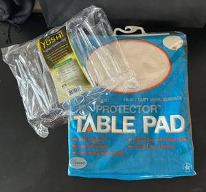 lot 143R image: LL - Yoshi 8-Piece Plastic Stemware Set & Protector Table Pad