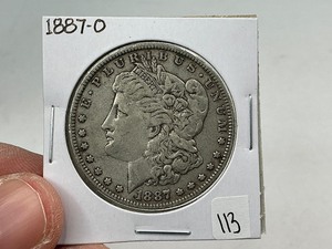 lot 113 image: 1887-O Silver Morgan Dollar