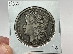 lot 32 image: 1902 Silver Morgan Dollar