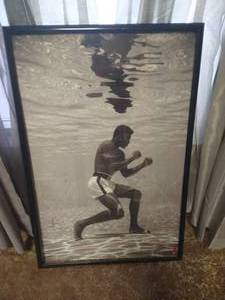 lot 144 image: Framed Mohammed Ali Picture