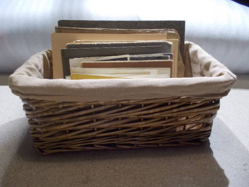 lot 12 image: Basket Full of Vintage Black and White Photos