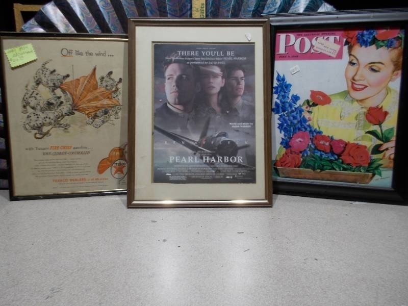 lot 26 image: The image displays three framed vintage collectibles,