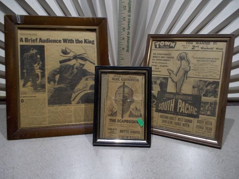 lot 52 image: These are framed vintage newspaper clippings or movie lobby cards