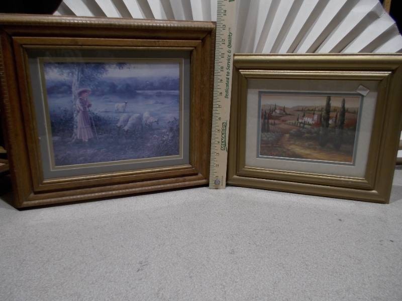 lot 55 image: The image displays two framed art prints