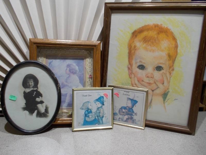 lot 68 image: This collection of vintage prints includes the well-known All American Boy series advertising art by artist Frances Hook for Northern Paper Mills.